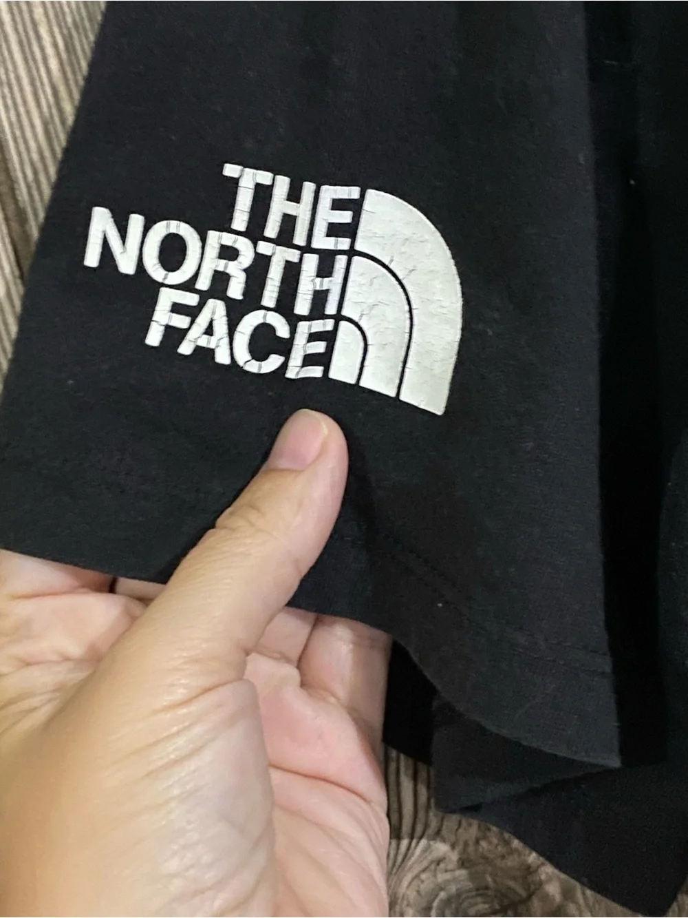 The North Face Black Short-Sleeve Tee with Multicolor Geometric Logo